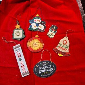 7 wooden ornaments for tree or wall.